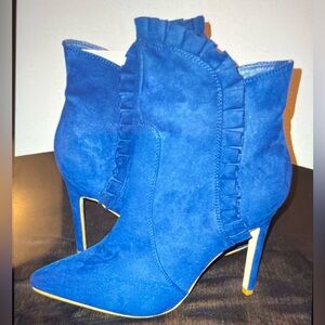 JUST FAB: Faux Suede Ruffle Latrice Boots.